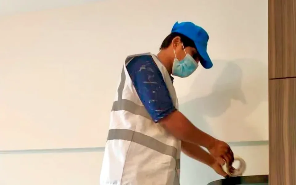 GulfNest professional painter carrying out interior painting and wall preparation in Dubai UAE